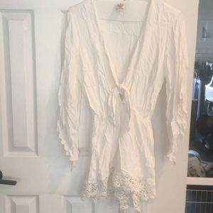 White crepe long-sleeved romper with tie front